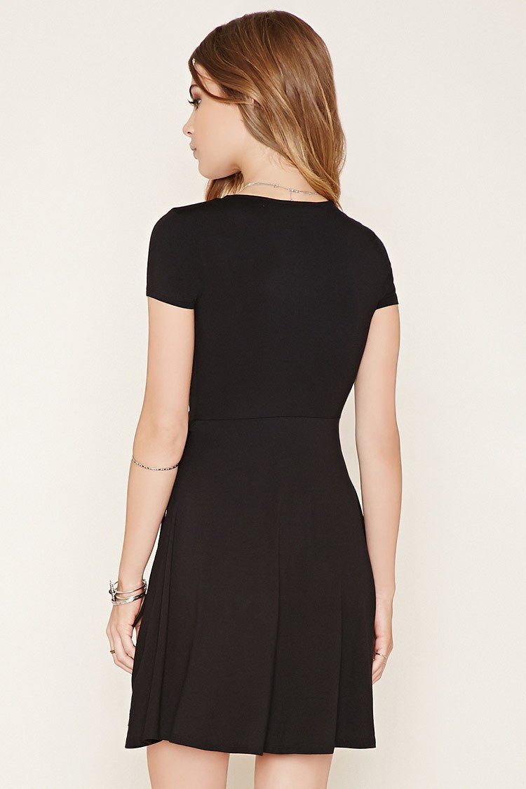 Allison Pleated Dip Hem Dress in Black