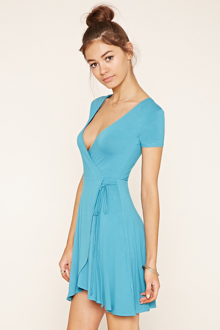 Allison Pleated Dip Hem Dress in Blue